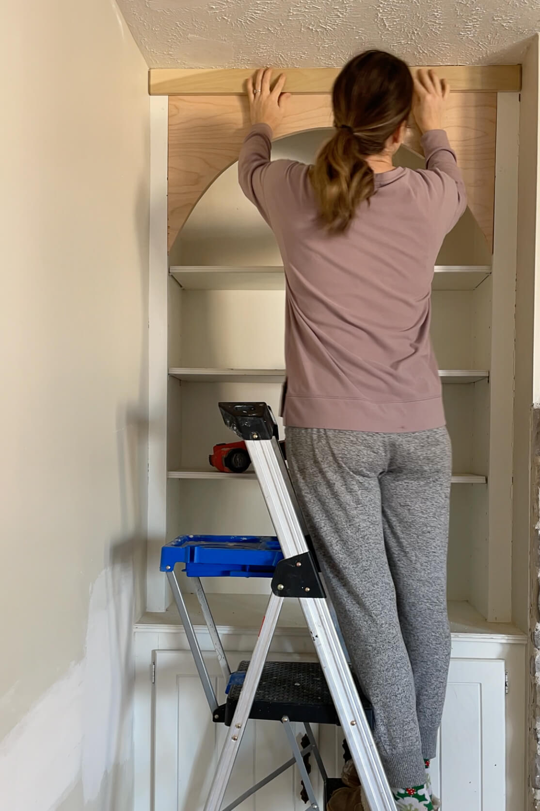 Building a DIY arched shelf.